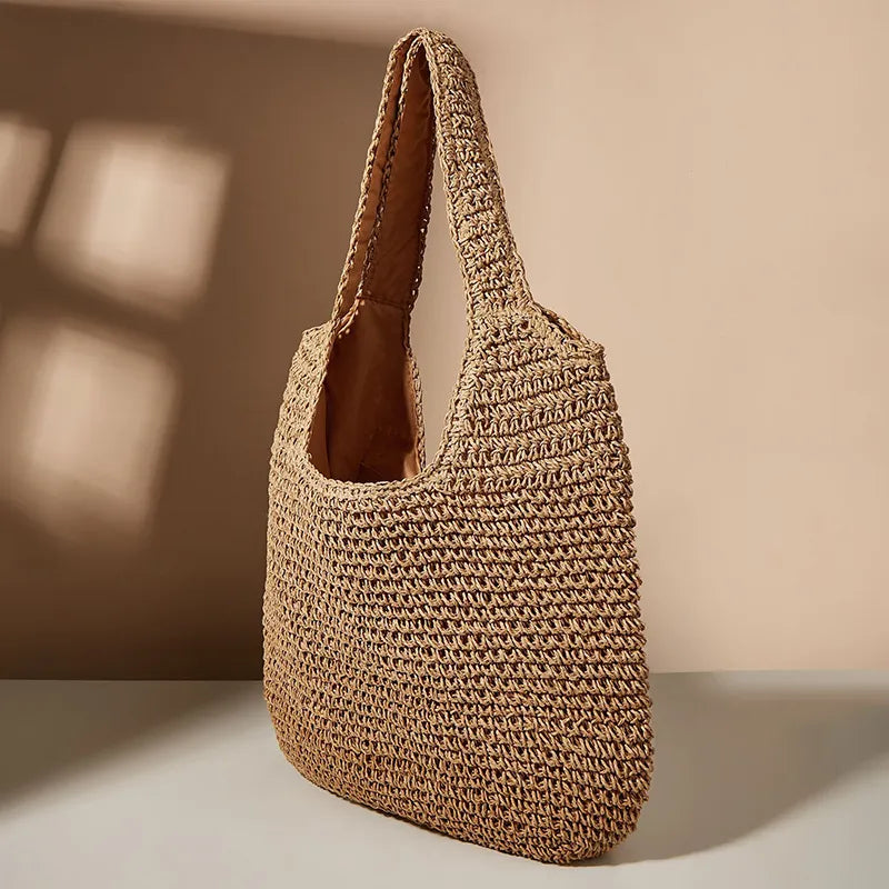 Round straw shoulder bag - Shreya