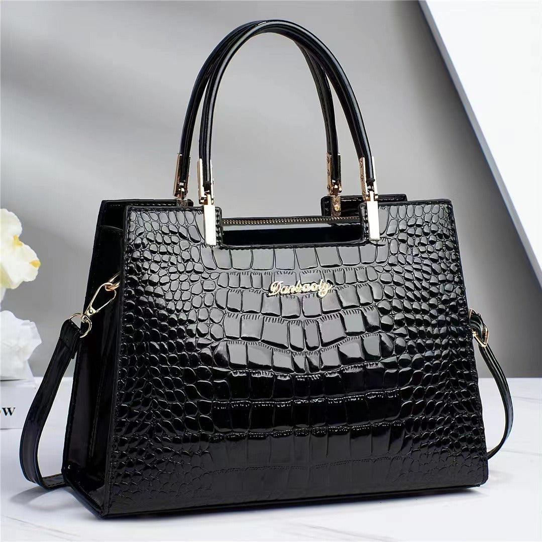 Wilja | Shiny leather handbag with crocodile pattern