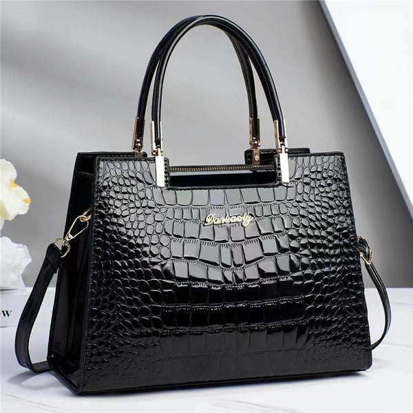 Wilja | Shiny leather handbag with crocodile pattern