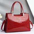Shiny crocodile handbag