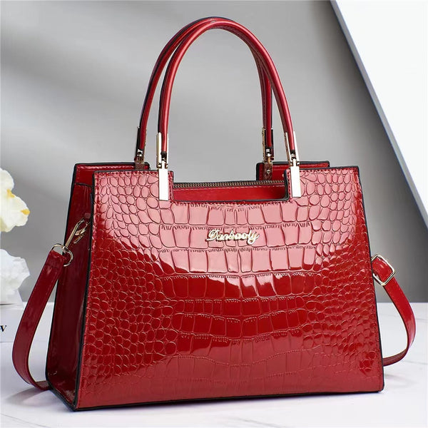 Shiny crocodile handbag
