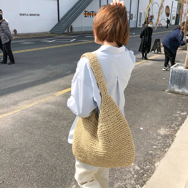 Round straw shoulder bag for summer - Satiro