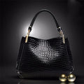 Xella | Elegant handbag with crocodile pattern
