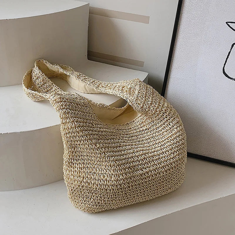 Round straw shoulder bag - Shreya