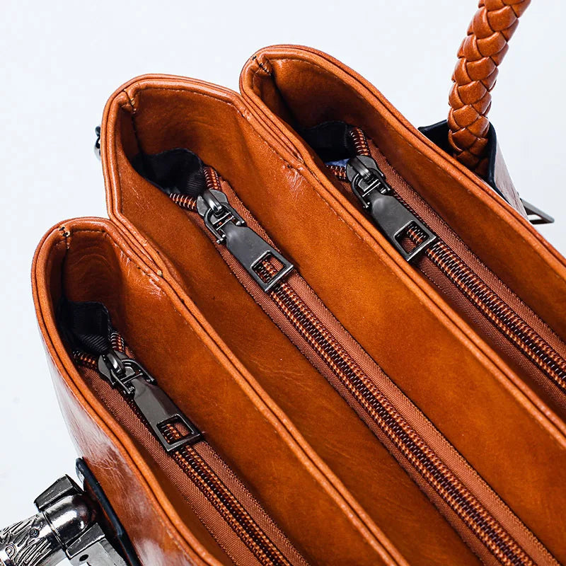 Pia | "Elegant leather handbag with braided handle".