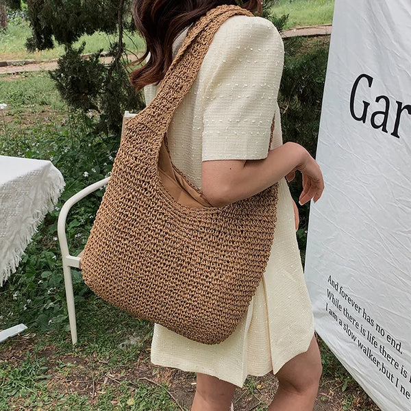 Round straw shoulder bag for summer - Satiro
