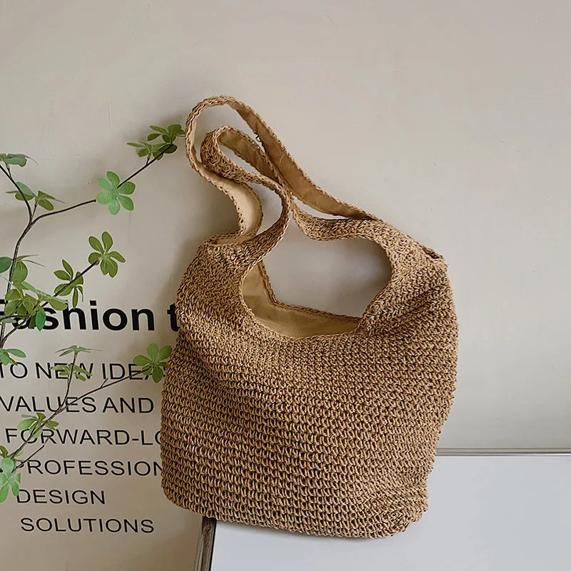 Round straw shoulder bag for summer - Satiro