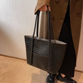 Iversen™ Betina | Vintage brown leather shoulder bag with crocodile print.