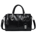 Pia | "Elegant leather handbag with braided handle".