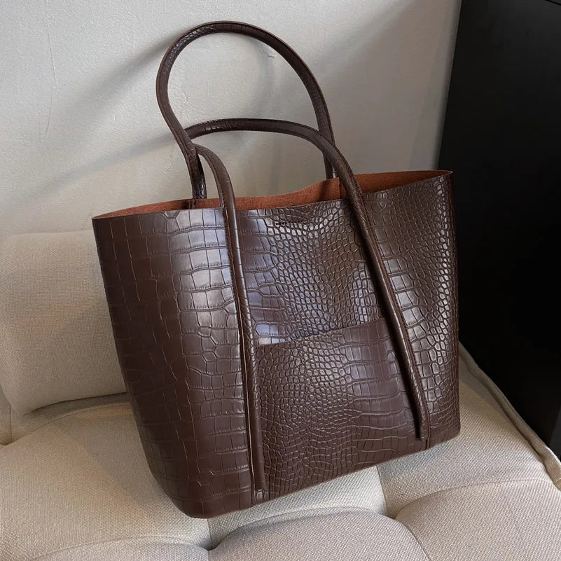 Iversen™ Betina | Vintage brown leather shoulder bag with crocodile print.