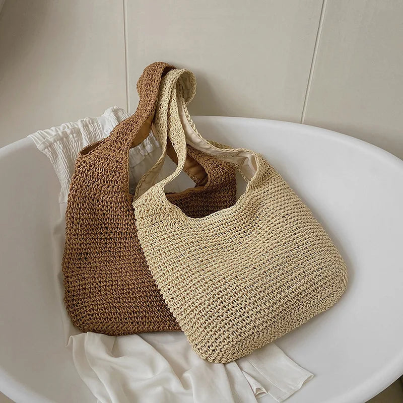 Round straw shoulder bag - Shreya