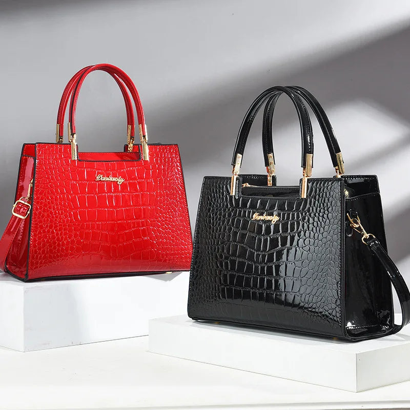 Wilja | Shiny leather handbag with crocodile pattern