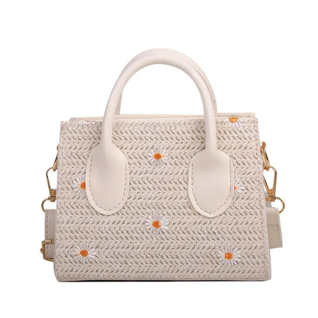 Woven handbag with floral accents - Serena